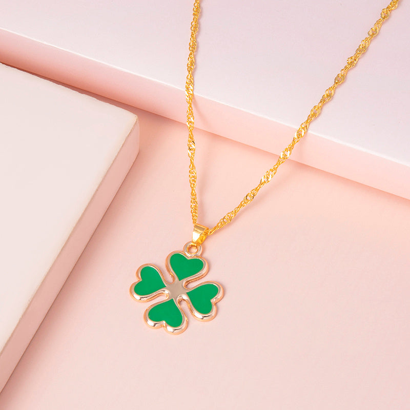 "Enamel Green Four-Heart Clover Necklace for Women – A Symbol of Luck and Elegance"