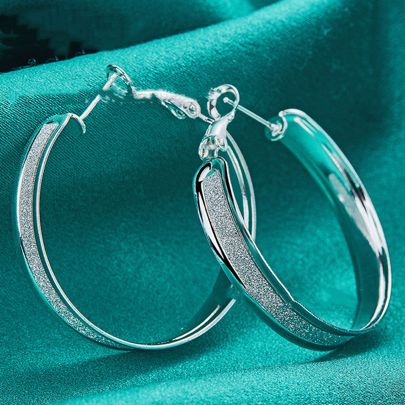 "Elegant Silver Glitter Hoop Earrings – Timeless Sparkle for Effortless Glam"