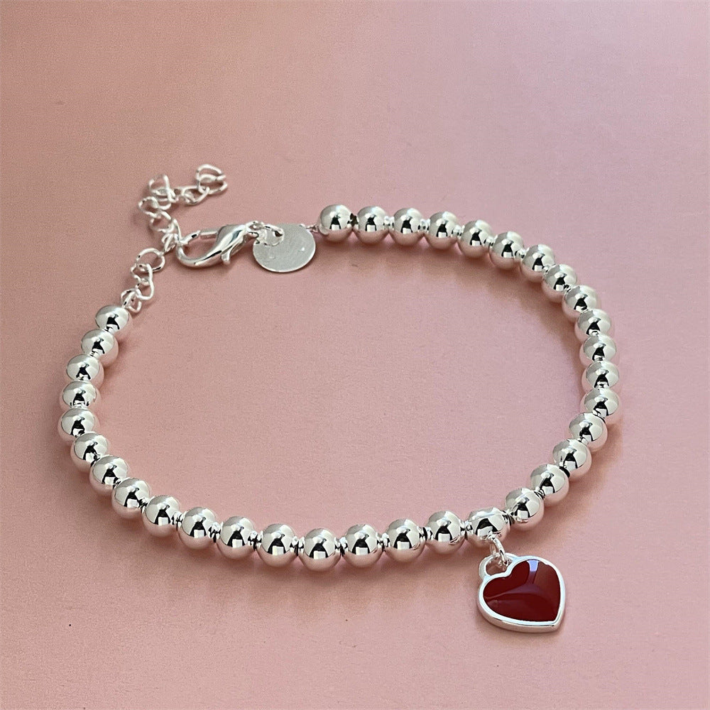 "Women's Fashion Personalized Red Heart Bracelet – A Charming Statement Piece"