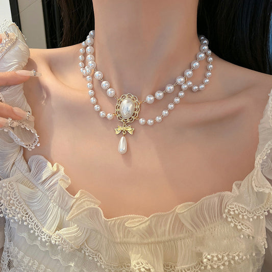 "Royal Whimsy – Retro Baroque Pearl Tassel Necklace"