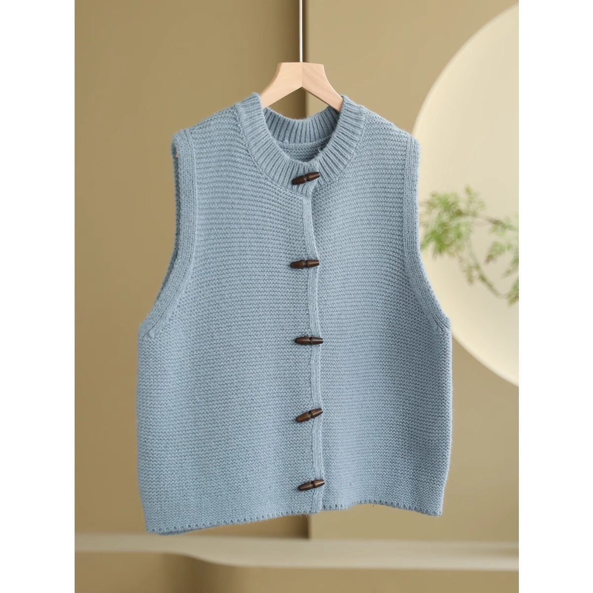 "Women's Sleeveless Round Neck Horn Button Top – Casual Chic Style for All Seasons"