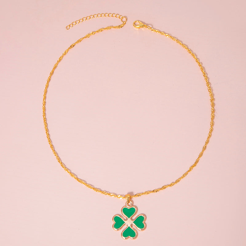 "Enamel Green Four-Heart Clover Necklace for Women – A Symbol of Luck and Elegance"