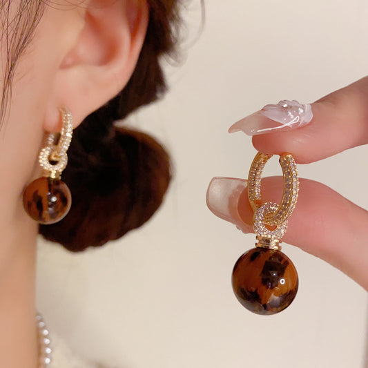 "Autumn and Winter Leopard Earrings – Refined, Stylish, and Versatile"