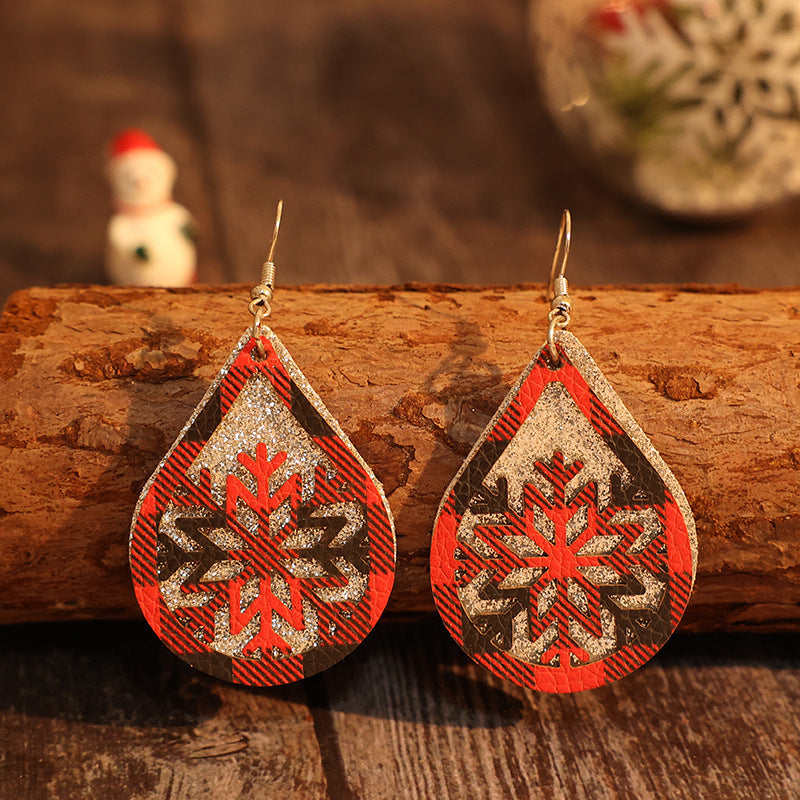 "Double-Layer Silver Red Black Plaid Hollow Snowflake Leather Earrings – Festive & Fashionable Statement Jewelry"