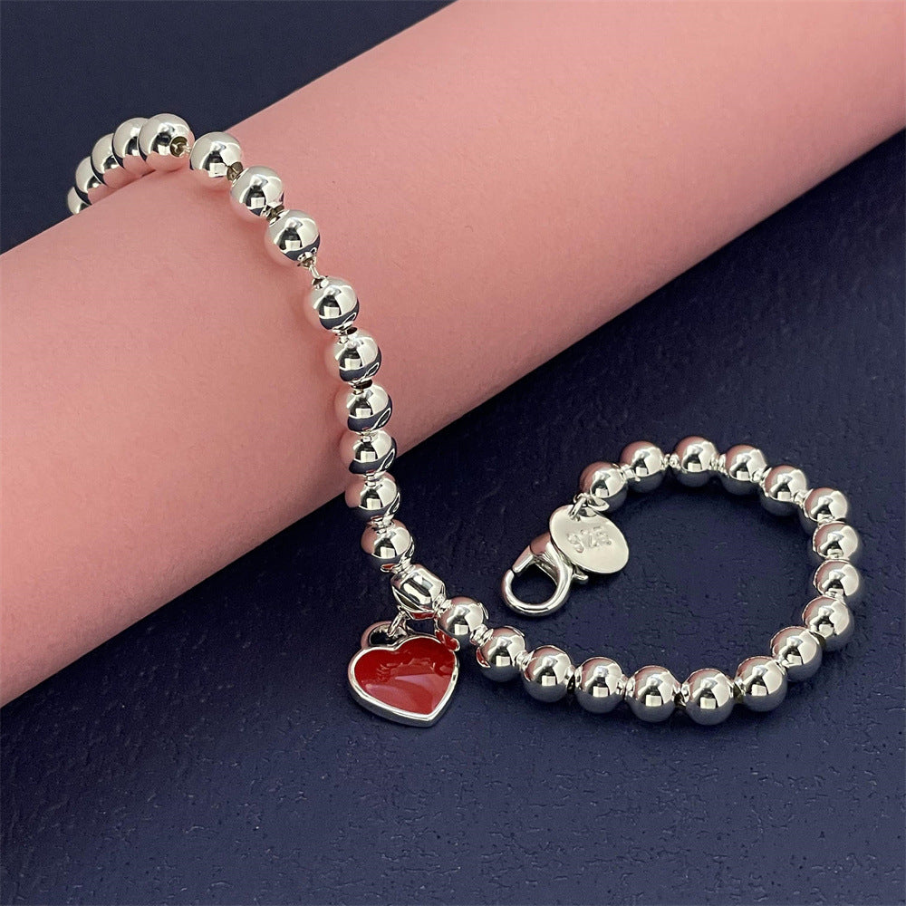 "Women's Fashion Personalized Red Heart Bracelet – A Charming Statement Piece"