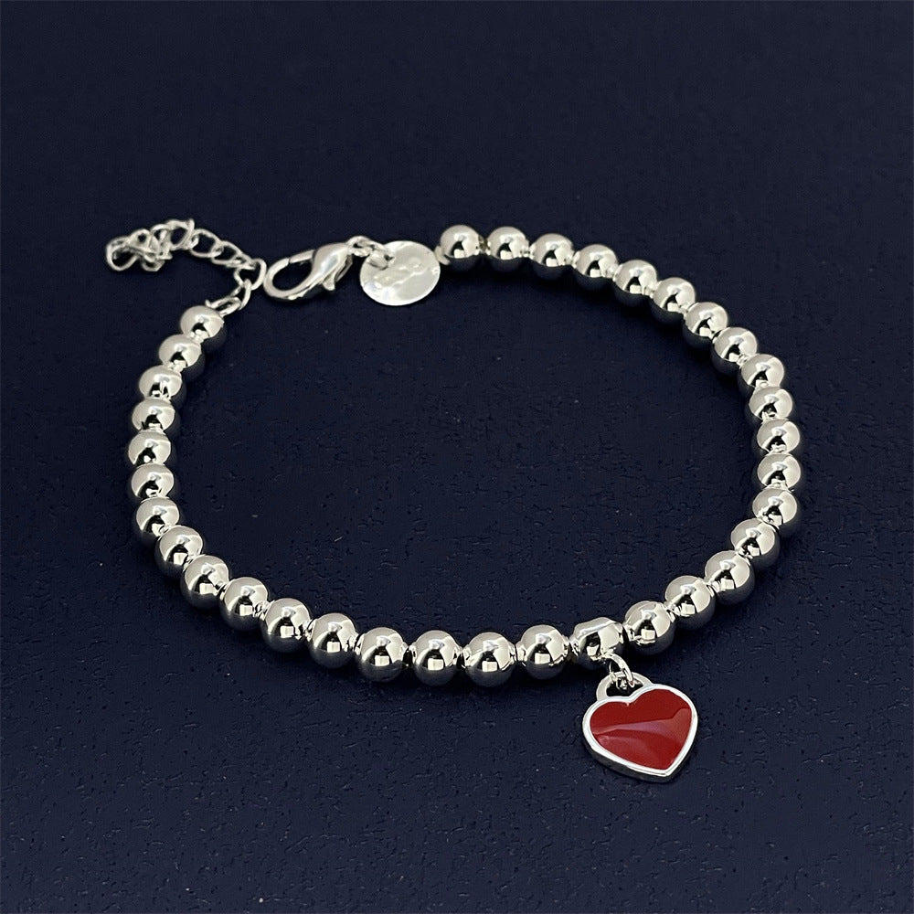 "Women's Fashion Personalized Red Heart Bracelet – A Charming Statement Piece"