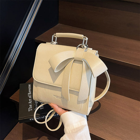 "Chic Charm – Bow Accent Fashion Backpack for Women"