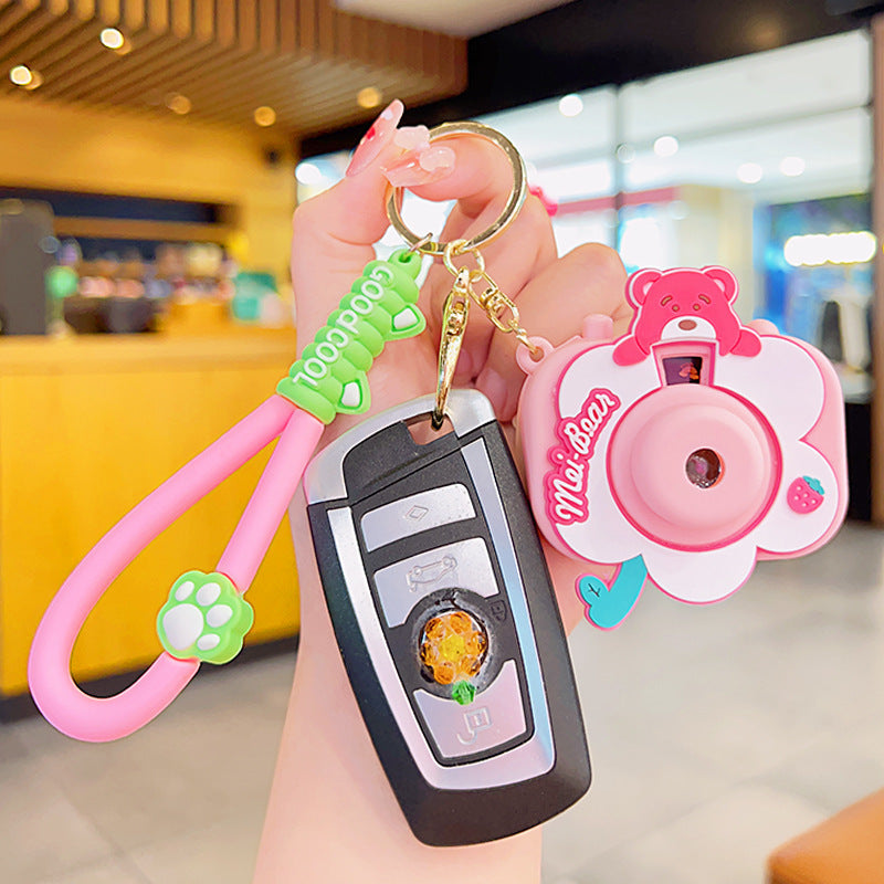 "Bear Sweet Projection Camera Luminous Keychain Ornaments – Cute & Magical Light-Up Accessory"