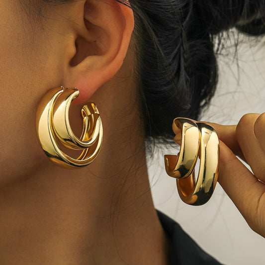 "Exaggerated Double Ring Glossy Metal C-Shaped Earrings – Bold and Modern Statement Jewelry"